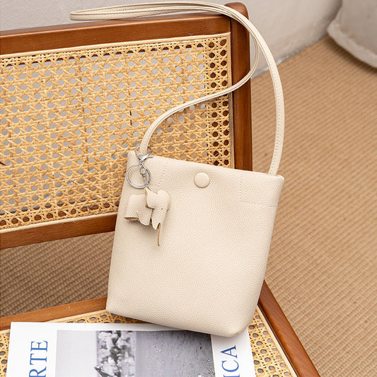 The first layer of cow leather mini Tote bucket bag for women's 2024 new casual and versatile leather bag for women's one-shoulder messenger bag